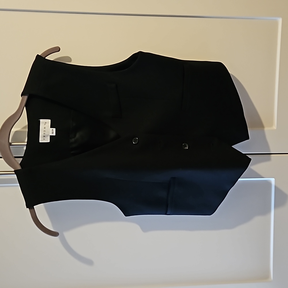 Freda's short black vest